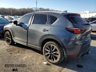 2021 Mazda CX-5 Touring with VIN JM3KFBCM5M0396053, listed as a Copart auction lot 83620274 with 50,463 mi miles and Salvage Title. Bid and sale history available at carsss.com. Image 2.