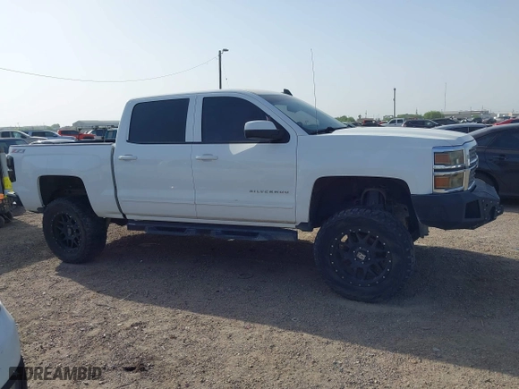 2015 Chevrolet Silverado 1500 LT with VIN 3GCUKREC1FG289851, listed as a IAAI auction lot 41676144 with 131,633 mi miles. Bid and sale history available at carsss.com. Image 13.