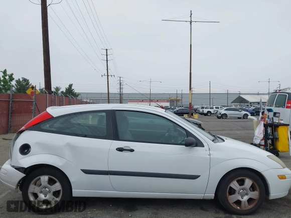2003 Ford Focus ZX3 with VIN 3FAFP31Z23R147547, listed as a IAAI auction lot 42426117 with 129,860 mi miles and . Bid and sale history available at DreamBid. Image 12.