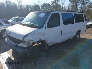2001 Ford Econoline Passenger XL with VIN 1FBSS31S11HA07065, listed as a IAAI auction lot 41717128 with 112,584 mi miles and . Bid and sale history available at DreamBid. Image 2.