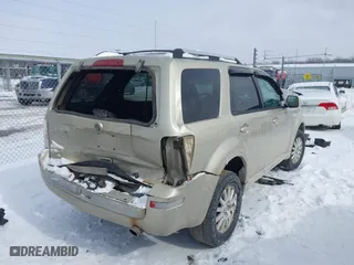 2010 Mercury Mariner Premier with VIN 4M2CN8H72AKJ05699, listed as a IAAI auction lot 41631468 with 205,563 mi miles. Bid and sale history available at carsss.com. Image 4.
