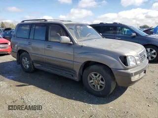 2000 Lexus LX 470 z VIN JT6HT00W9Y0120042, wystawiony jako Copart lot #49644355 z przebiegiem 188 992 mil mil oraz Czysty tytuł • Clean title. Historia ofert i sprzedaży dostępna na DreamBid. Obrazek 4.
