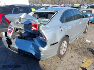 2015 Volkswagen Passat 1.8T S with VIN 1VWAT7A30FC022274, listed as a IAAI auction lot 41418742 with 139,214 mi miles. Bid and sale history available at carsss.com. Image 4.