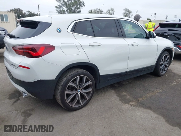 2022 BMW X2 sDrive28i z VIN WBXYH9C06N5U37719, wystawiony jako IAAI lot #42355050 z przebiegiem 33 127 mil mil oraz . Historia ofert i sprzedaży dostępna na DreamBid. Obrazek 4.