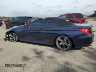 2015 BMW M6 z VIN WBSLZ9C59FD651474, wystawiony jako Copart lot #60882454 z przebiegiem Nie podano mil oraz Szkody całkowita. Historia ofert i sprzedaży dostępna na DreamBid. Obrazek 2.