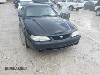 1998 Ford Mustang z VIN 1FAFP4442WF252712, wystawiony jako IAAI lot #42428073 z przebiegiem 118 477 mil mil oraz . Historia ofert i sprzedaży dostępna na DreamBid. Obrazek 1.
