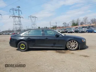 2012 Audi A8 L with VIN WAURVAFD7CN004673, listed as a IAAI auction lot 41768222 with 108,982 mi miles. Bid and sale history available at carsss.com. Image 14.