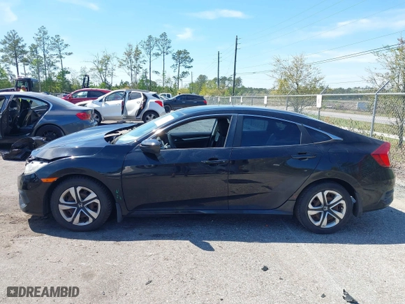 2017 Honda Civic Sedan LX with VIN 19XFC2F57HE061090, listed as a IAAI auction lot 41887402 with 129,167 mi miles. Bid and sale history available at carsss.com. Image 14.