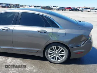 2014 Lincoln MKZ Hybrid с VIN 3LN6L2LU8ER822396, выставлен на аукционе IAAI как лот 42094086 с пробегом 166 203 миль миль и . История ставок и продаж доступна на DreamBid. Изображение 6.