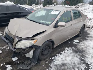 2009 Toyota Corolla with VIN 1NXBU40E19Z052903, listed as a IAAI auction lot 41305719 with 141,625 mi miles and . Bid and sale history available at carsss.com. Image 18.