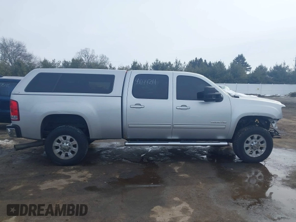 2011 GMC Sierra 2500HD SLT z VIN 1GT121C86BF242488, wystawiony jako IAAI lot #41644211 z przebiegiem 163 233 mil mil oraz . Historia ofert i sprzedaży dostępna na DreamBid. Obrazek 14.
