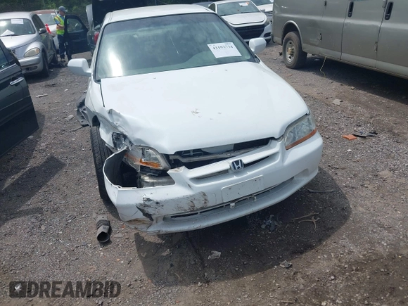 1999 Honda Accord LX z VIN JHMCG5643XC000176, wystawiony jako IAAI lot #42193734 z przebiegiem 261 485 mil mil oraz . Historia ofert i sprzedaży dostępna na DreamBid. Obrazek 6.