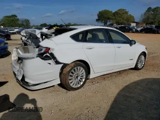 2015 Ford Fusion SE Hybrid with VIN 3FA6P0LU7FR249026, listed as a Copart auction lot 51867715 with 182,340 mi miles and Salvage Title. Bid and sale history available at DreamBid. Image 3.