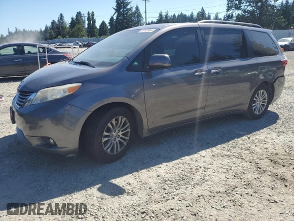 2015 Toyota Sienna XLE with VIN 5TDYK3DC7FS630252, listed as a Copart auction lot 65182965 with 90,764 mi miles and Salvage title. Bid and sale history available at DreamBid. Image 1.