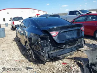 2021 Nissan Maxima SV with VIN 1N4AA6CV9MC506223, listed as a IAAI auction lot 41702758 with 88,345 mi miles. Bid and sale history available at carsss.com. Image 3.