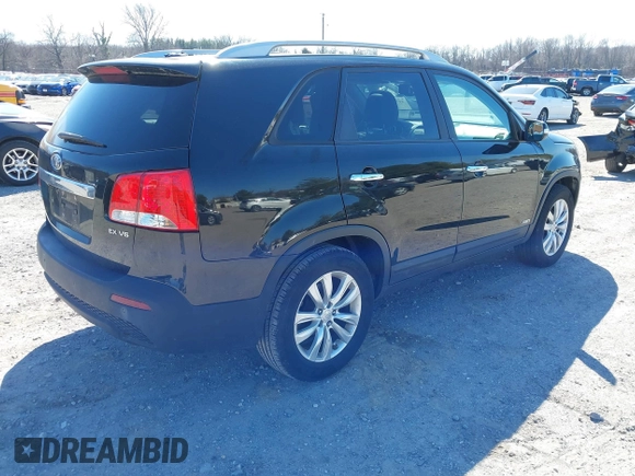 2011 Kia Sorento EX with VIN 5XYKUDA26BG001235, listed as a IAAI auction lot 41754357 with 131,321 mi miles. Bid and sale history available at carsss.com. Image 4.