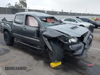 2015 Toyota Tacoma PreRunner z VIN 3TMJU4GN4FM185497, wystawiony jako IAAI lot #42383134 z przebiegiem 86 864 mil mil oraz . Historia ofert i sprzedaży dostępna na DreamBid. Obrazek 1.