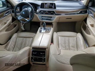 2016 BMW 7 Series 740i with VIN WBA7E2C51GG546677, listed as a Copart auction lot 63455445 with 106,553 mi miles and Salvage title. Bid and sale history available at DreamBid. Image 8.