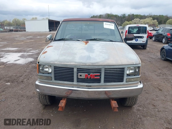 1989 GMC Sierra 2500 z VIN 1GTGK24K3KE532638, wystawiony jako IAAI lot #41830554 z przebiegiem 177 390 mil mil oraz . Historia ofert i sprzedaży dostępna na DreamBid. Obrazek 6.