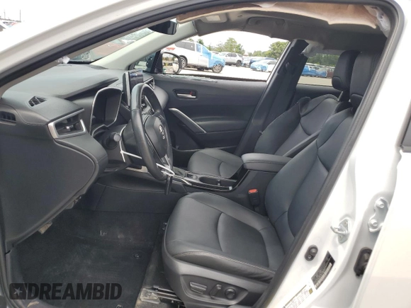 2023 Toyota Corolla Cross XLE z VIN 7MUDAAAG7PV051492, wystawiony jako Copart lot #61185635 z przebiegiem 79 364 mil mil oraz Nie do naprawy • Non repairable. Historia ofert i sprzedaży dostępna na DreamBid. Obrazek 7.