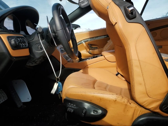 2013 Maserati GranTurismo Convertible Sport with VIN ZAM45VMAXD0071100, listed as a Copart auction lot 46999495 with 0 mi miles and Salvage Title. Bid and sale history available at carsss.com. Image 7.