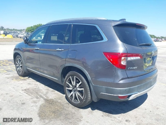 2020 Honda Pilot Touring 8-Passenger with VIN 5FNYF5H90LB000801, listed as a IAAI auction lot 41865605 with 62,743 mi miles. Bid and sale history available at carsss.com. Image 3.