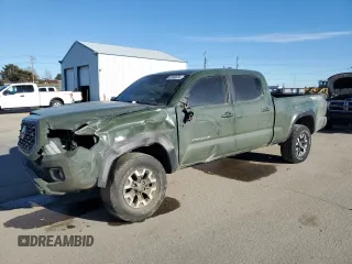 2021 Toyota Tacoma SR5 z VIN 5TFDZ5BN5MX061029, wystawiony jako Copart lot #87490334 z przebiegiem 66 711 mil mil oraz Szkoda całkowita • Salvage title. Historia ofert i sprzedaży dostępna na DreamBid. Obrazek 1.