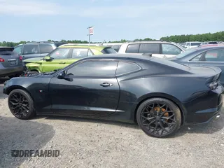 2019 Chevrolet Camaro 1LT z VIN 1G1FA1RX1K0127249, wystawiony jako IAAI lot #42240323 z przebiegiem 69 945 mil mil oraz . Historia ofert i sprzedaży dostępna na DreamBid. Obrazek 15.