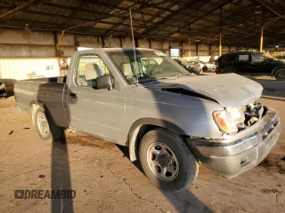 2000 Nissan Frontier XE z VIN 1N6DD21S5YC340513, wystawiony jako Copart lot #89018755 z przebiegiem 237 418 mil mil oraz Szkoda całkowita • Salvage title. Historia ofert i sprzedaży dostępna na DreamBid. Obrazek 4.