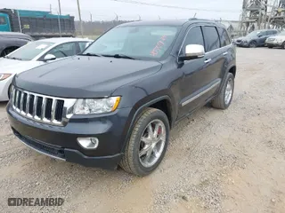 2013 Jeep Grand Cherokee Limited with VIN 1C4RJFBG1DC618482, listed as a IAAI auction lot 40707340 with 108,102 mi miles. Bid and sale history available at carsss.com. Image 2.