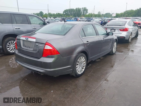 2010 Ford Fusion Hybrid with VIN 3FADP0L37AR242651, listed as a IAAI auction lot 42457758 with 196,894 mi miles and . Bid and sale history available at DreamBid. Image 4.