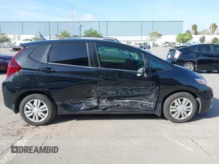 2015 Honda Fit LX with VIN 3HGGK5G5XFM737172, listed as a IAAI auction lot 42053332 with 80,690 mi miles and . Bid and sale history available at carsss.com. Image 13.
