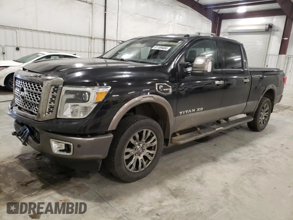 2016 Nissan Titan XD Platinum Reserve with VIN 1N6BA1F49GN517376, listed as a Copart auction lot 81189484 with 147,435 mi miles and Salvage Title. Bid and sale history available at carsss.com. Image 1.