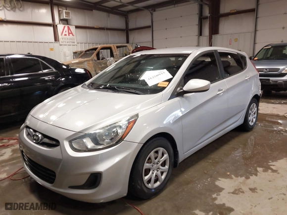 2013 Hyundai Accent GS with VIN KMHCT5AE4DU121779, listed as a IAAI auction lot 41250935 with 152,128 mi miles. Bid and sale history available at carsss.com. Image 18.