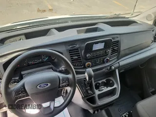 2023 Ford Transit Cargo with VIN 1FTBR1X87PKC01635, listed as a IAAI auction lot 42832727 with 17,348 mi miles and . Bid and sale history available at DreamBid. Image 15.