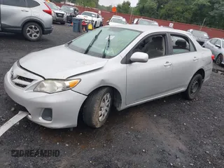 2011 Toyota Corolla L with VIN 2T1BU4EE1BC724135, listed as a IAAI auction lot 40054479 with 190,235 mi miles. Bid and sale history available at carsss.com. Image 16.