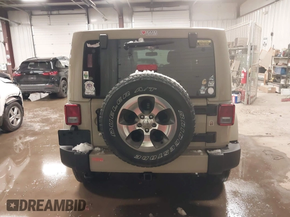 2018 Jeep Wrangler JK Unlimited Sahara with VIN 1C4HJWEG4JL803516, listed as a IAAI auction lot 41127652 with 85,749 mi miles. Bid and sale history available at carsss.com. Image 17.