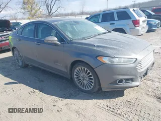 2014 Ford Fusion Titanium Hybrid with VIN 3FA6P0RU6ER210210, listed as a IAAI auction lot 41613028 with 203,410 mi miles. Bid and sale history available at carsss.com. Image 1.