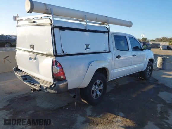 2013 Toyota Tacoma with VIN 3TMLU4EN7DM122791, listed as a IAAI auction lot 41484858 with 236,795 mi miles and . Bid and sale history available at DreamBid. Image 4.