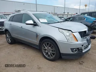 2015 Cadillac SRX Performance Collection z VIN 3GYFNCE36FS633386, wystawiony jako IAAI lot #41851338 z przebiegiem 102 586 mil mil oraz . Historia ofert i sprzedaży dostępna na DreamBid. Obrazek 1.