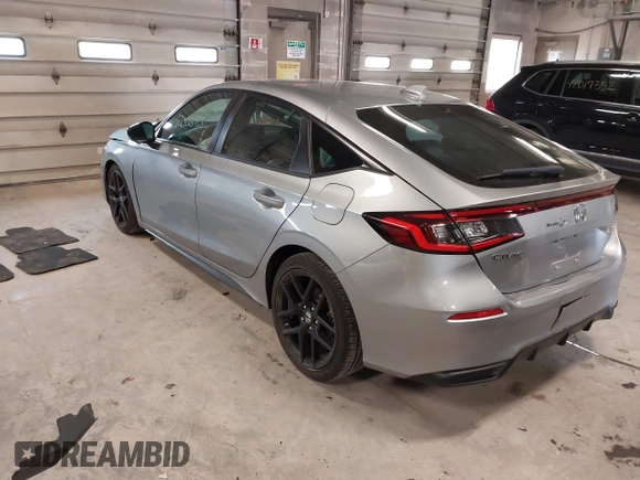 2023 Honda Civic Sport with VIN 19XFL2H80PE010679, listed as a IAAI auction lot 42026973 with 25,701 mi miles and . Bid and sale history available at DreamBid. Image 3.