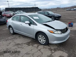 2012 Honda Civic LX z VIN 2HGFB2F57CH300607, wystawiony jako IAAI lot #41738097 z przebiegiem 201 074 mil mil oraz . Historia ofert i sprzedaży dostępna na DreamBid. Obrazek 1.