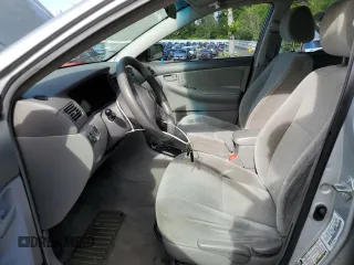 2005 Toyota Corolla CE with VIN 1NXBR32E25Z513898, listed as a Copart auction lot 57679695 with 189,869 mi miles and Salvage title. Bid and sale history available at DreamBid. Image 7.