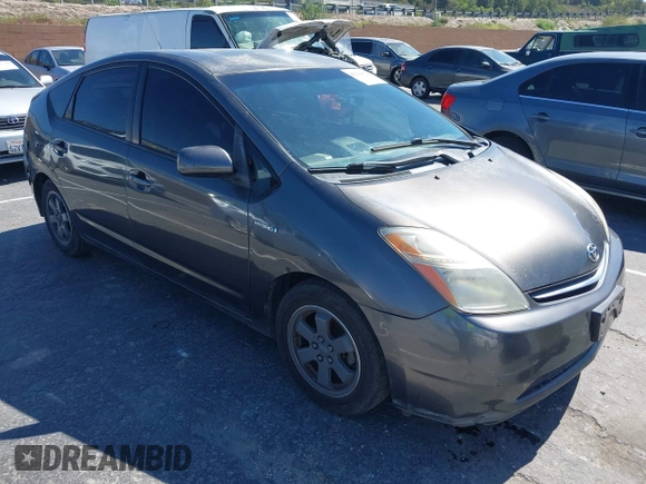 2007 Toyota Prius with VIN JTDKB20U373293385, listed as a IAAI auction lot 42218812 with 149,218 mi miles and . Bid and sale history available at DreamBid. Image 1.