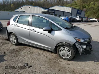 2019 Honda Fit LX z VIN 3HGGK5H41KM712693, wystawiony jako Copart lot #52069275 z przebiegiem 68 522 mil mil oraz Szkoda całkowita • Salvage title. Historia ofert i sprzedaży dostępna na DreamBid. Obrazek 4.