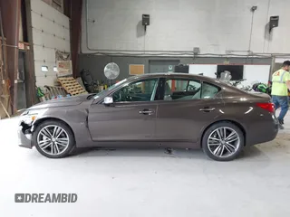 2014 Infiniti Q50 Sport with VIN JN1BV7AR5EM694526, listed as a IAAI auction lot 42782010 with 145,152 mi miles and . Bid and sale history available at DreamBid. Image 14.