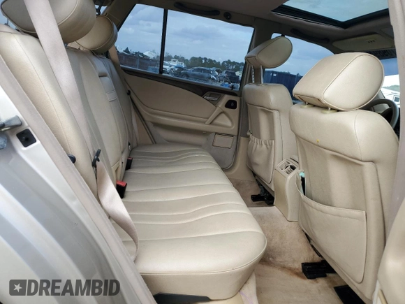 1998 Mercedes-Benz E-Class with VIN WDBJH65F7WA546101, listed as a Copart auction lot 47098945 with 227,453 mi miles and Salvage Title. Bid and sale history available at carsss.com. Image 10.