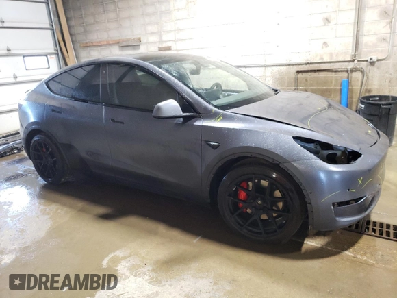 2021 Tesla Model Y Performance with VIN 5YJYGDEF2MF134700, listed as a Copart auction lot 56325685 with 66,730 mi miles and Salvage Title. Bid and sale history available at DreamBid. Image 4.