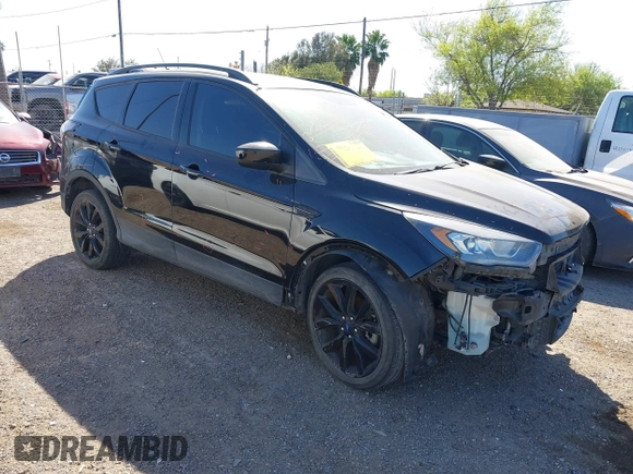 2018 Ford Escape SE z VIN 1FMCU9GD3JUC75754, wystawiony jako IAAI lot #41761965 z przebiegiem 101 771 mil mil oraz . Historia ofert i sprzedaży dostępna na DreamBid. Obrazek 1.