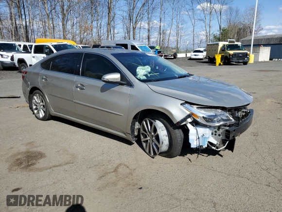 2014 Toyota Avalon Limited with VIN 4T1BK1EB4EU080093, listed as a Copart auction lot 54106595 with 108,995 mi miles and Salvage Title. Bid and sale history available at DreamBid. Image 4.